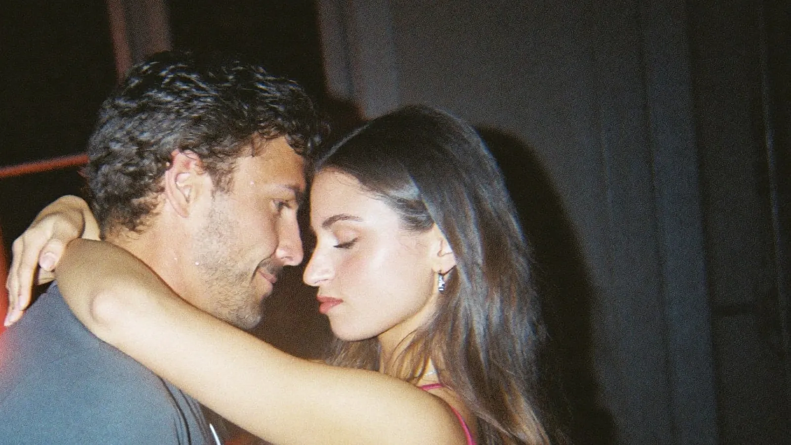Couple slow dancing at night